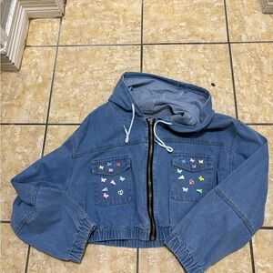 Blue Denim Jacket with Colorful Patches